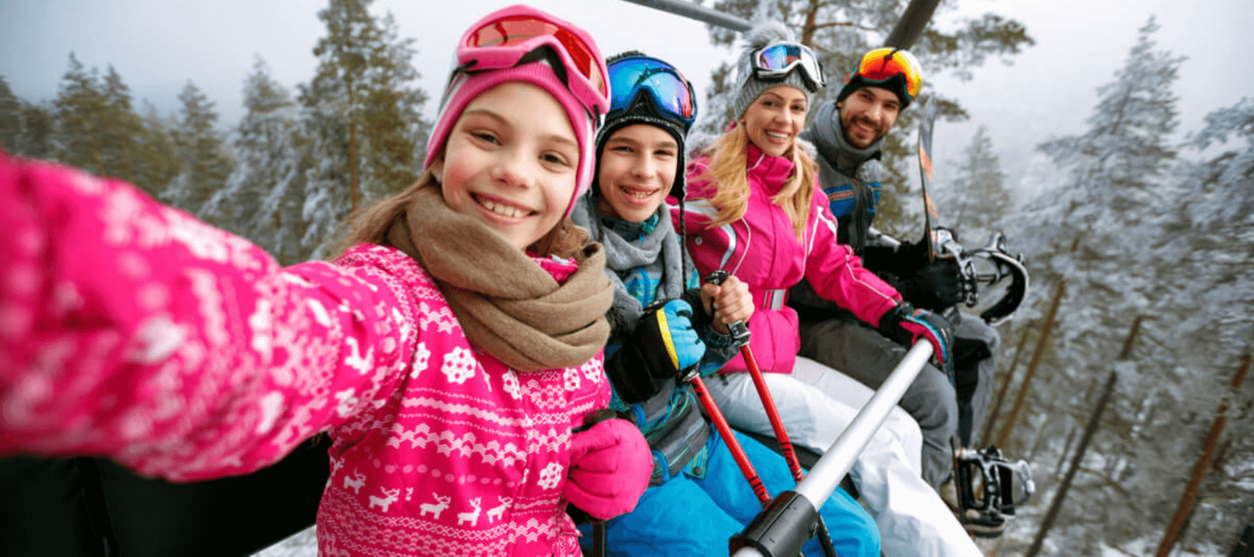 family on ski lift