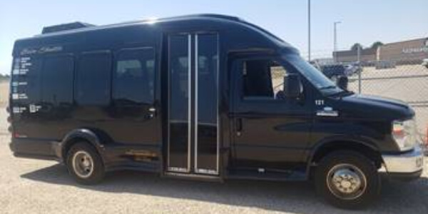 Caldwell Transportation Company shuttle van side angle