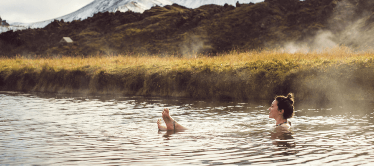 woman swimming in hot spring